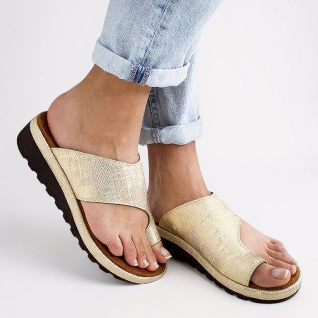 Side angle of women's summer sandals with open-toe structure and moulded arch support for all-day wear