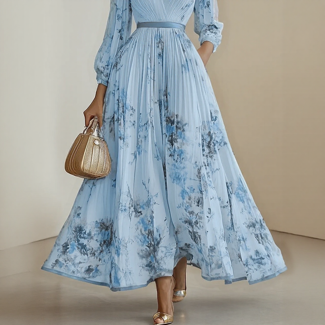 Full-length view of Elegant Pleated Maxi Dress in blue with floral print pattern