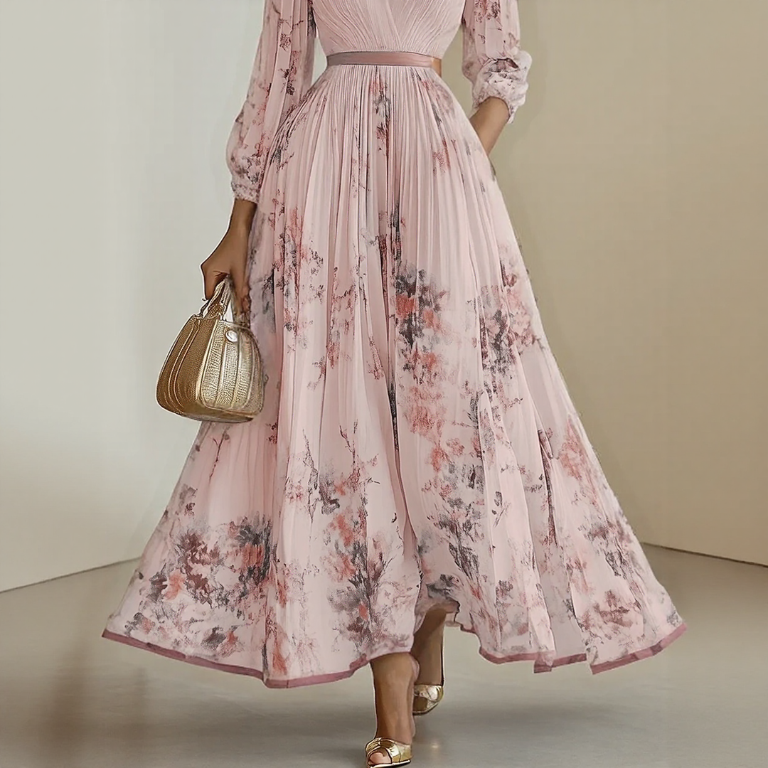 Close-up of Elegant Pleated Maxi Dress fabric showing soft pleating and floral detail