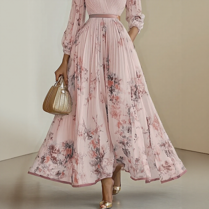 Close-up of Elegant Pleated Maxi Dress fabric showing soft pleating and floral detail