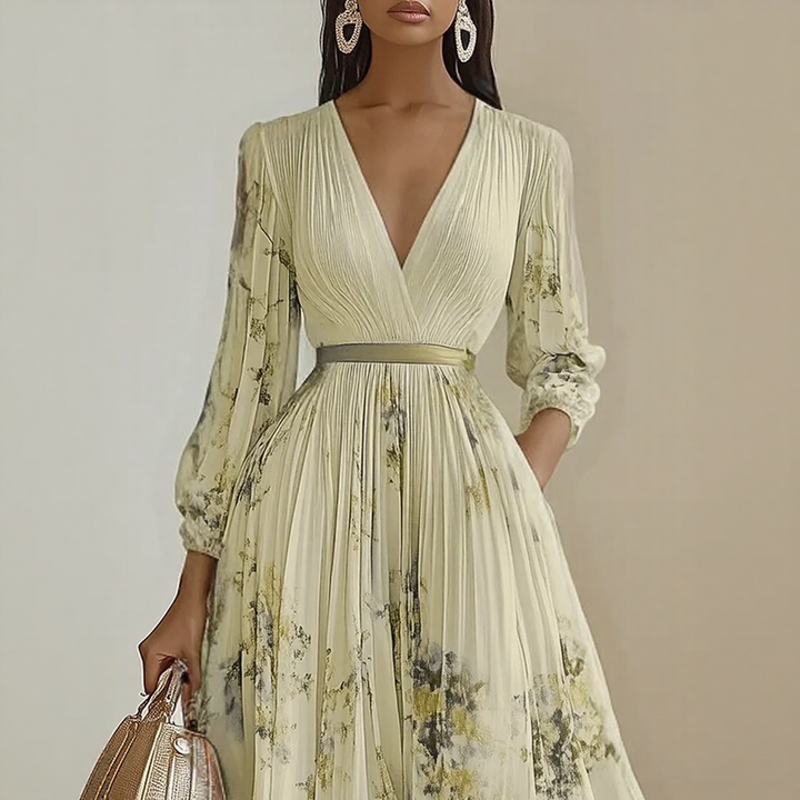 Side angle of Elegant Pleated Maxi Dress displaying V-neck and long sleeve construction