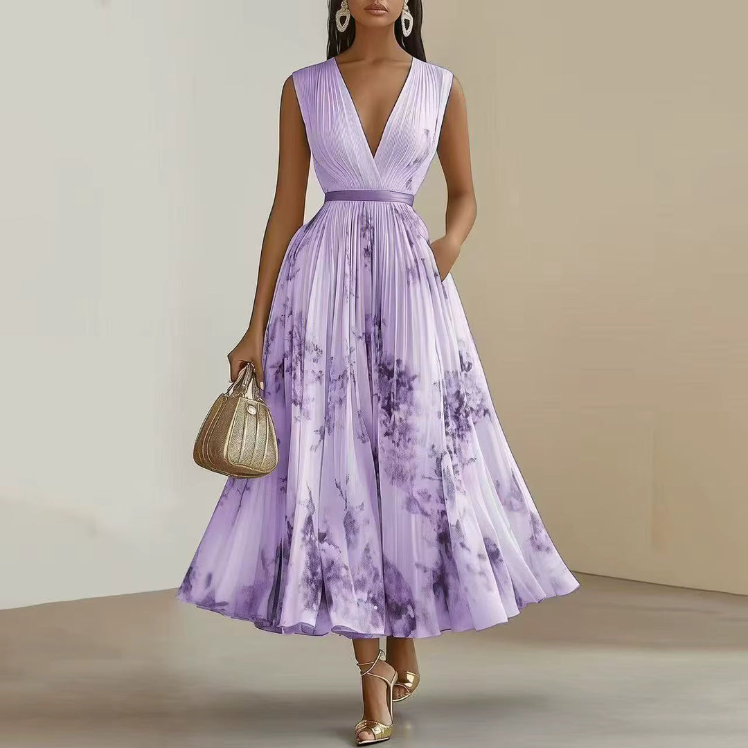 Side view of Elegant Pleated Maxi Dress displaying flowing pleated skirt and long sleeves