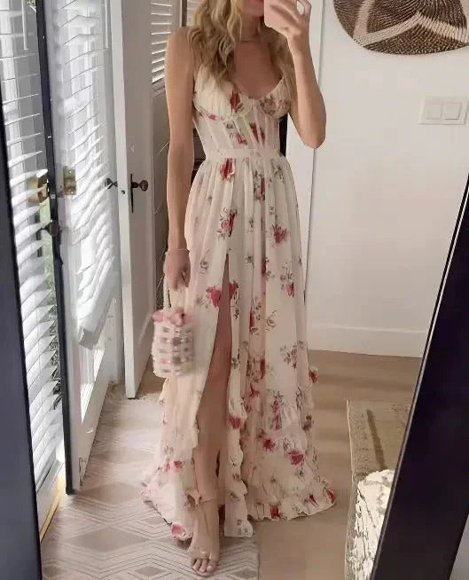 Close-up view of floral maxi dress bodice showing slim straps and romantic print detail