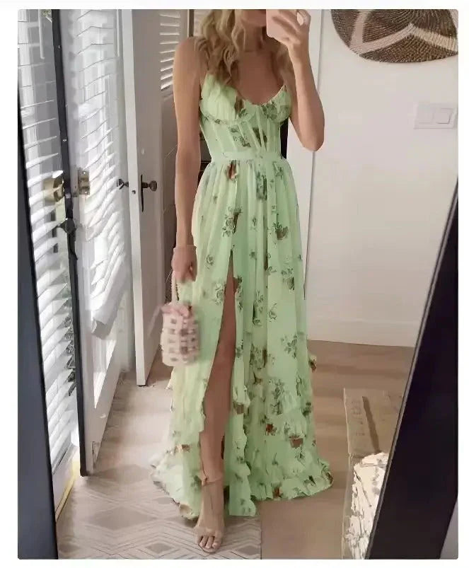 Side view of flowing floral maxi dress highlighting side slit and graceful drape