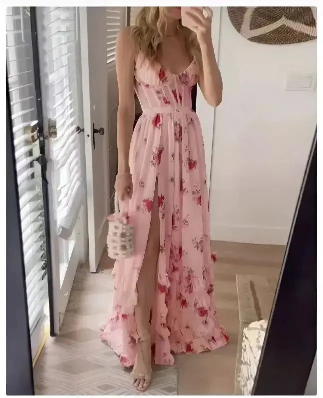 Full-length floral maxi dress with fitted bodice and floor-length flowing skirt