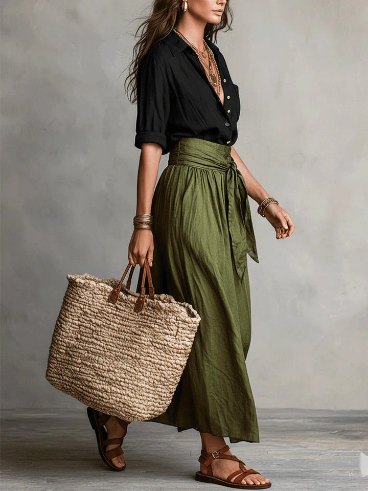 Close-up view of Women Casual Skirt Two-Piece Set showing relaxed button-up shirt and flowing gathered skirt