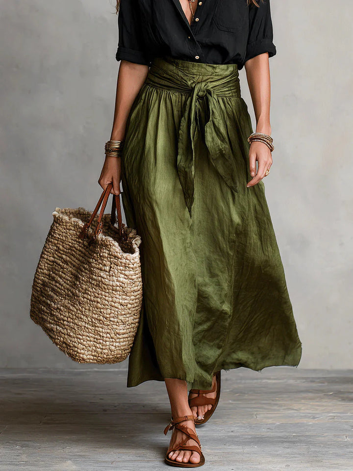Full-length view of Women Casual Skirt Two-Piece Set styled with layered jewellery and woven handbag