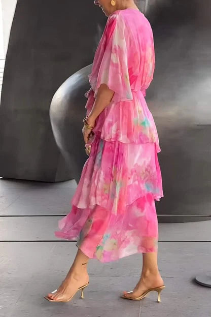 Full-length view of women's bohemian print maxi dress with ruffled tiers and ankle-length hem