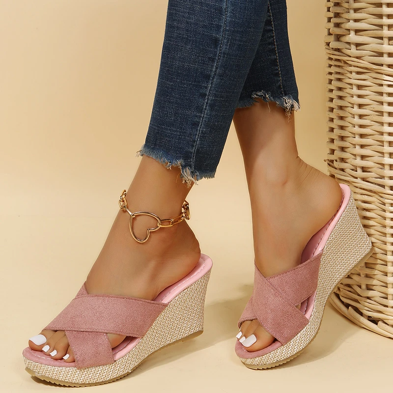 Close-up of crossover strap design on women's orthopedic comfort sandals with open-toe construction