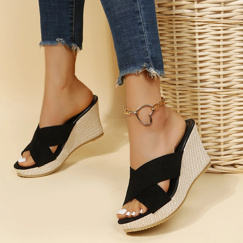 Women's orthopedic wedge sandals displaying arch support footbed and stable platform construction