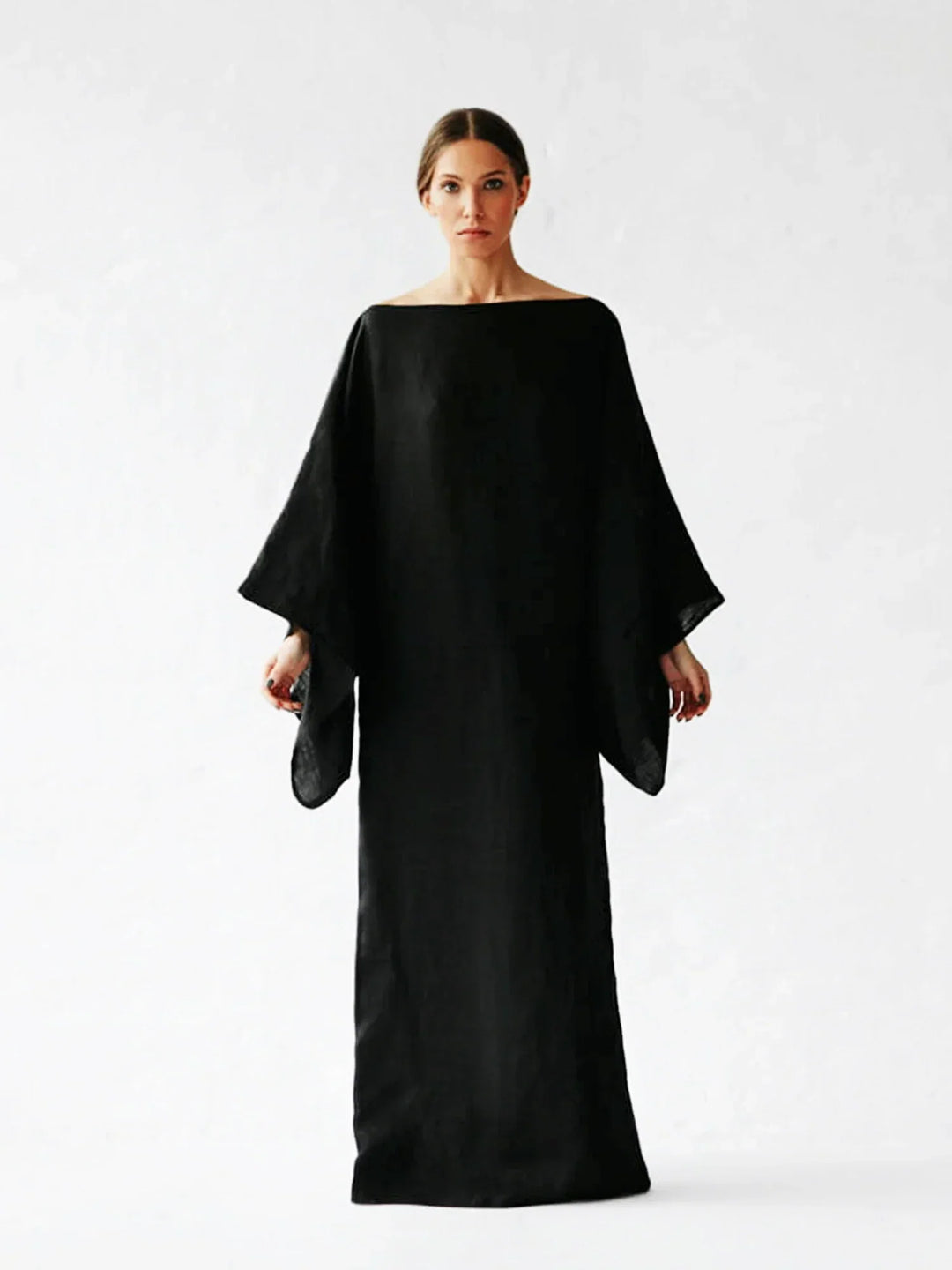 Women Elegant Kaftan Dress styled for resort wear with minimal accessories