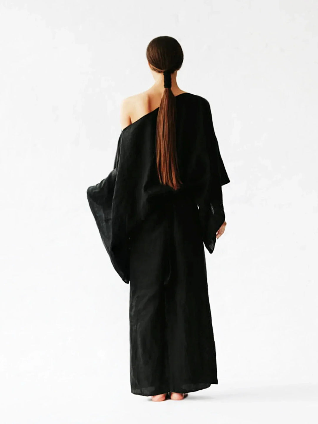 Close-up of Women Elegant Kaftan Dress neckline and smooth fabric finish