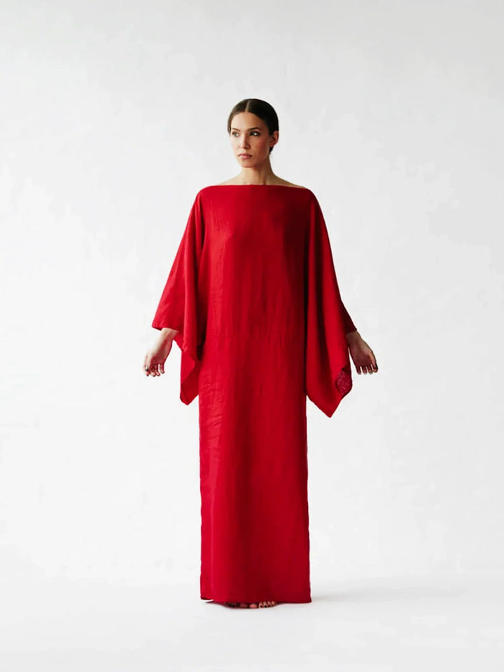 Women Elegant Kaftan Dress showing relaxed fit and midi-length hemline