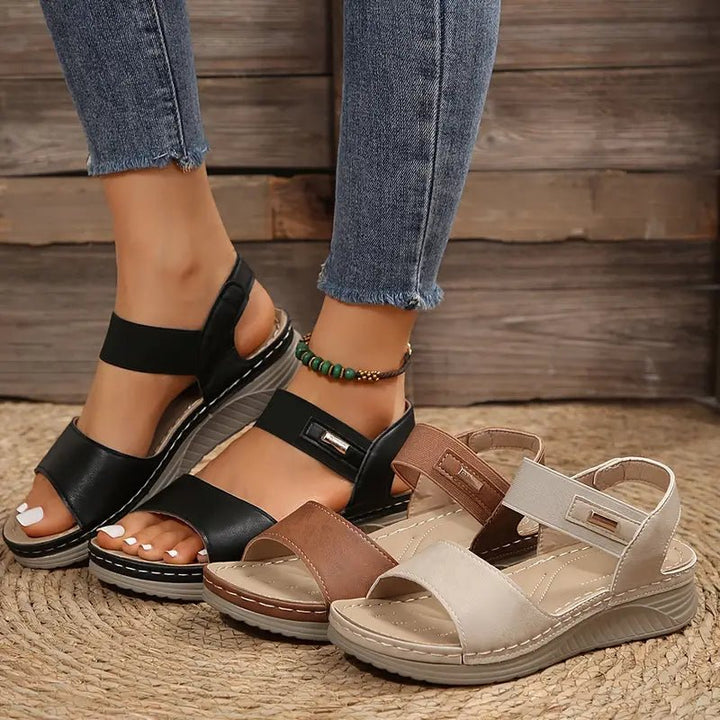 Women's orthopedic sandals with comfort support displayed from multiple angles, highlighting adjustable straps and contoured footbed design