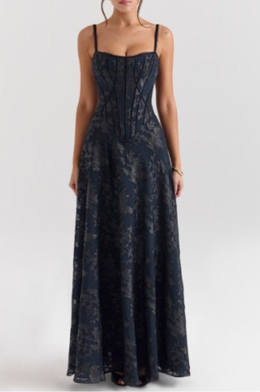 Full-length view of spaghetti strap chiffon floral formal dress showing graceful A-line silhouette