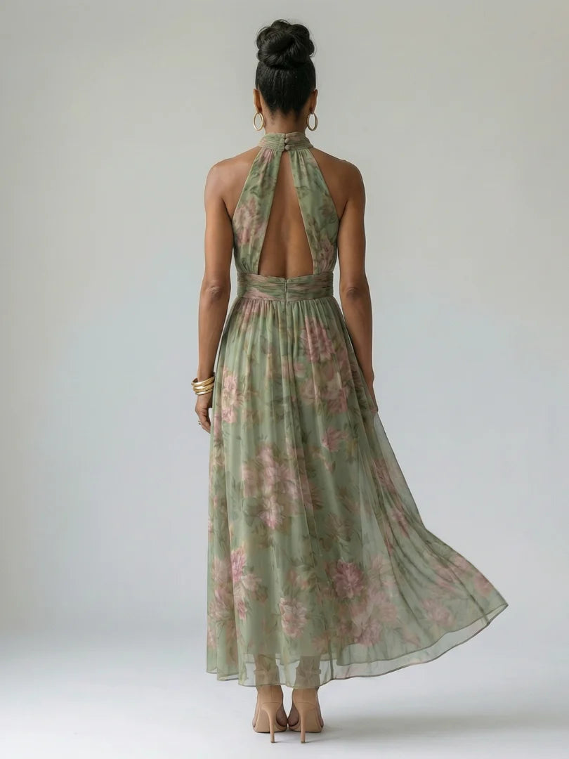 Close-up of gathered halterneck detail on floral midi dress with tie fastening
