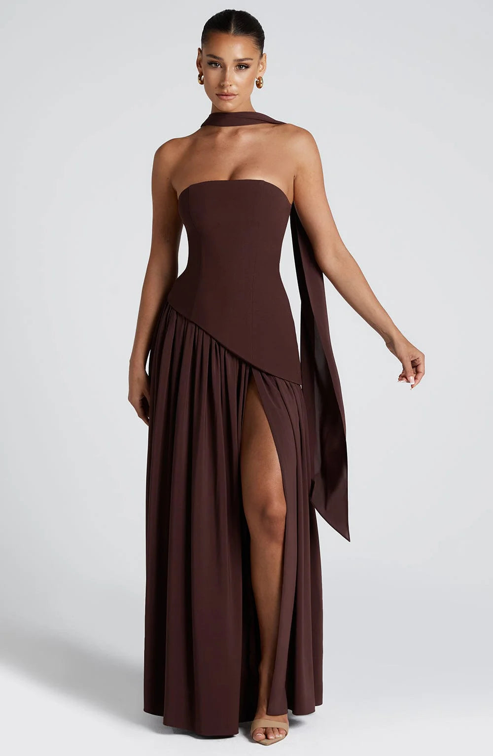 Detail of the flowing fabric and high front slit on the Strapless Maxi Dress