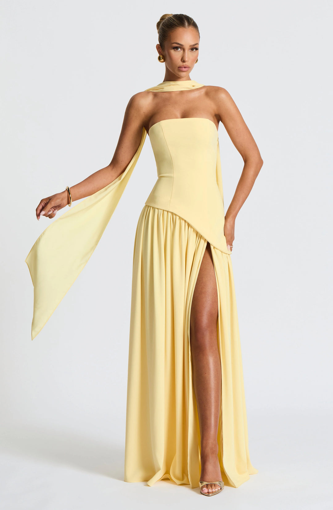 Close-up of the structured bodice construction and clean strapless neckline