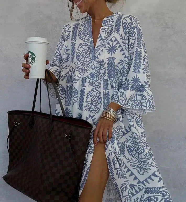 Side view of Women's Boho Patterned Long Sleeve Mini Dress showing loose-fitting mini length and long sleeves