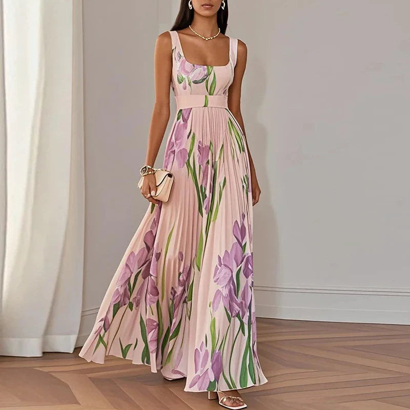 Front view of flowing maxi dress with watercolour floral pattern and fitted bodice