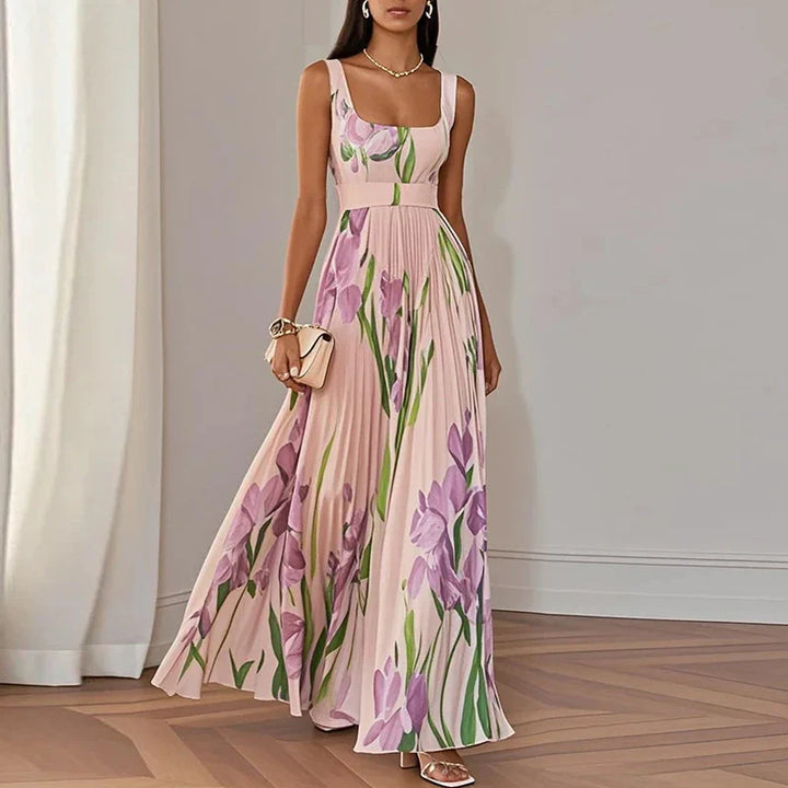 Front view of flowing maxi dress with watercolour floral pattern and fitted bodice