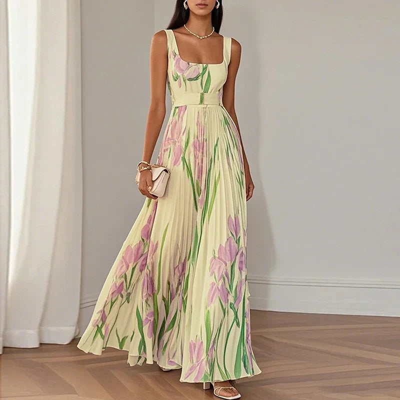 Full-length view showing A-line silhouette and pleated skirt with botanical design
