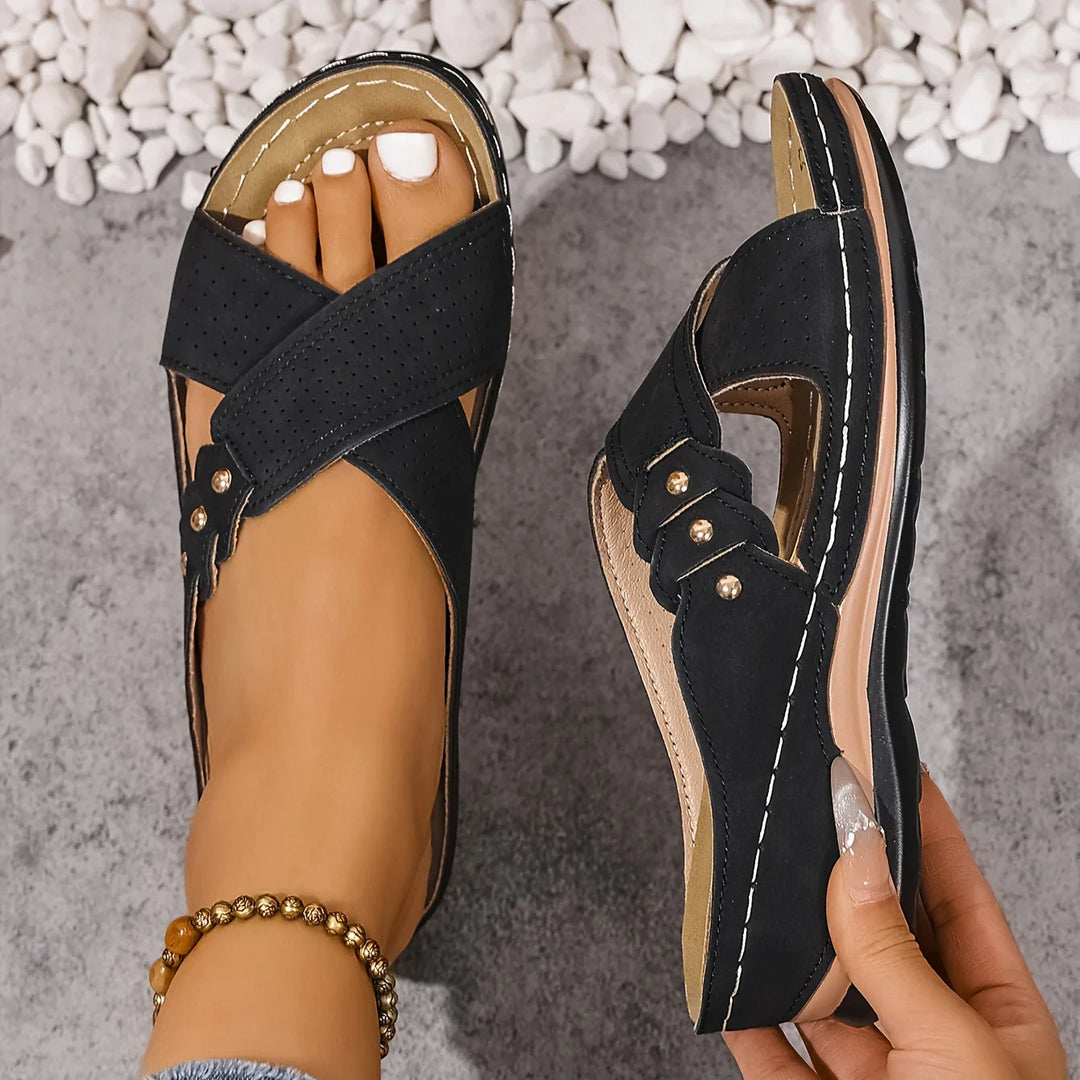 Close-up of soft perforated upper material on women's orthopaedic wedge sandals