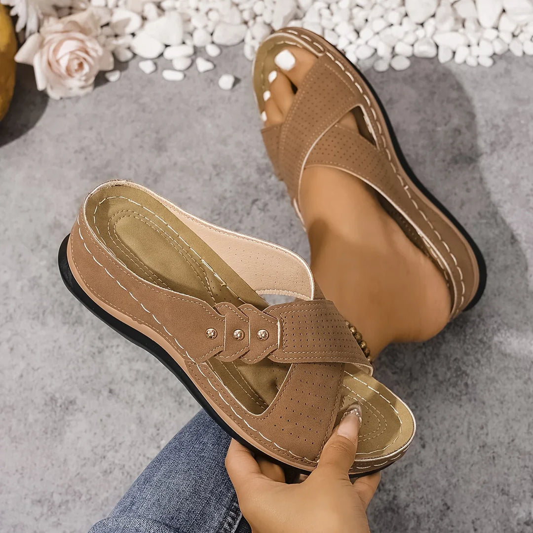 Close-up of wedge heel and sole construction on supportive orthopaedic sandals for women