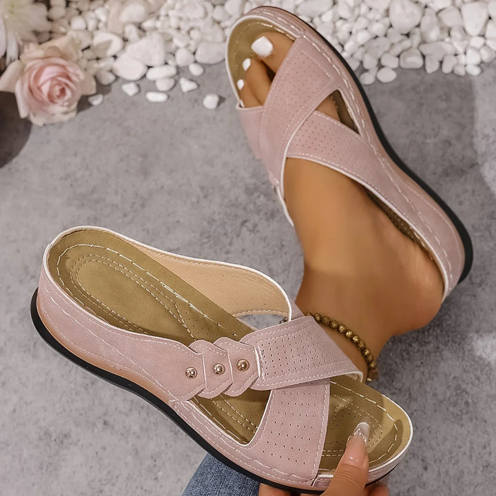 Rear view of wedge sandals showing heel height and stable sole platform
