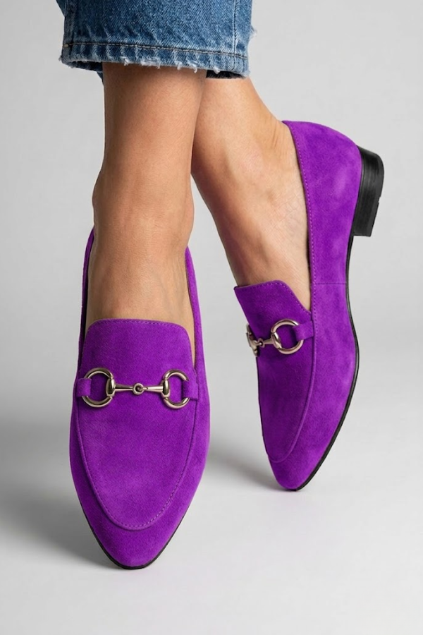 Full view of vibrant green canvas moccasins with flexible sole and easy slip-on closure design