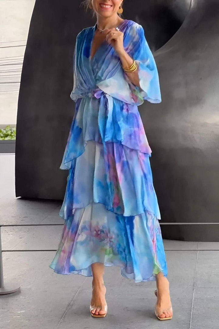 Women's bohemian maxi dress with sheer chiffon construction and ruffled tier detailing