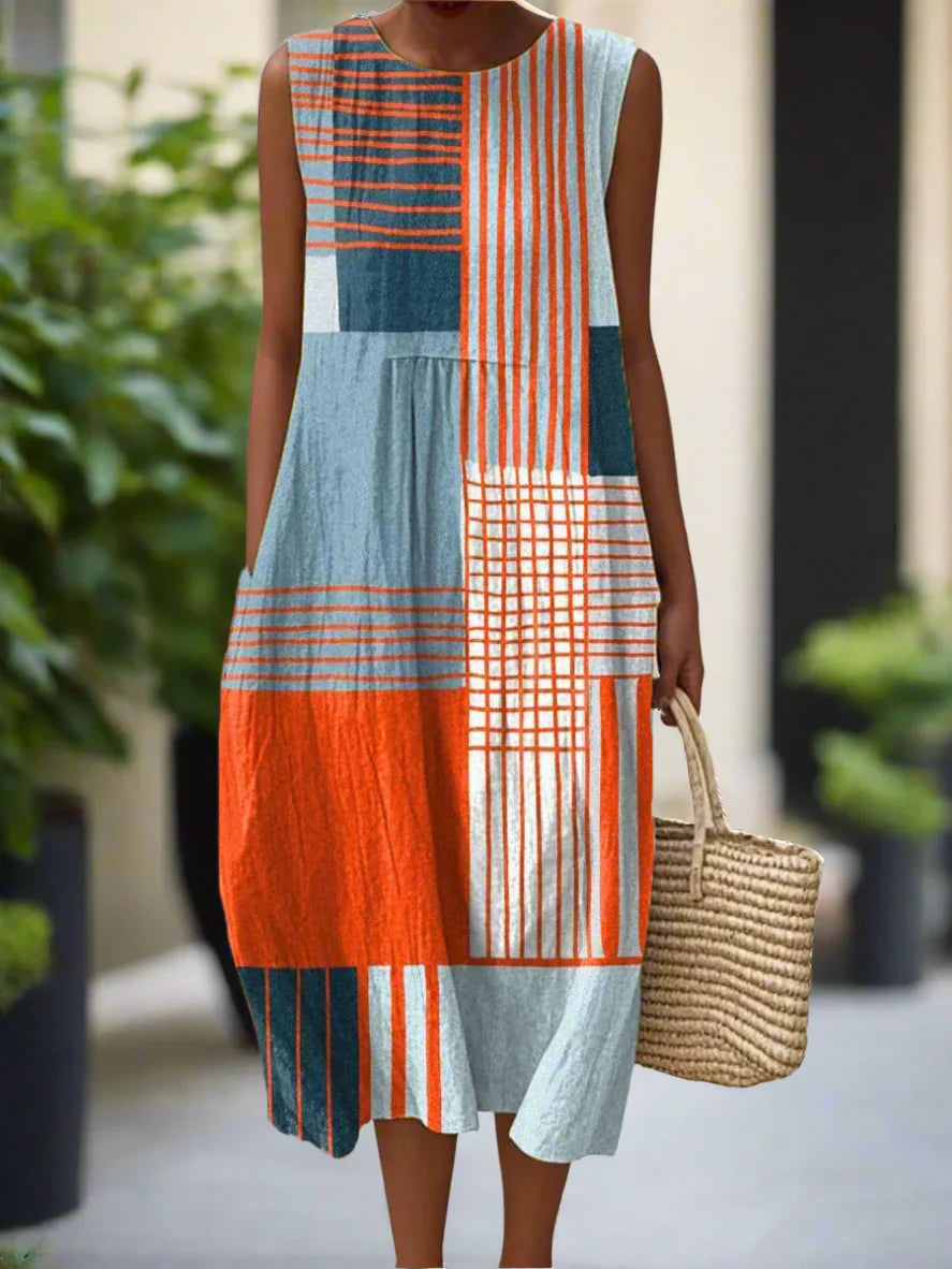Women's Midi Dress with Geometric Design and Relaxed Fit featuring colour-blocked stripes and checks in orange, blue, and white tones with practical side pockets
