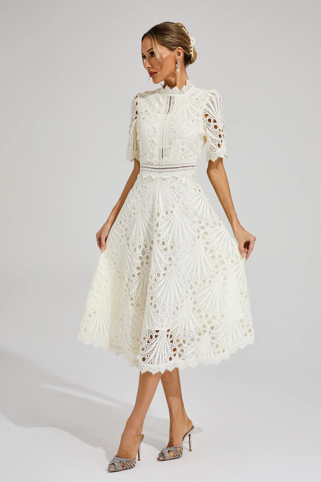 Crochet midi dress with high neckline and intricate openwork pattern in ivory white