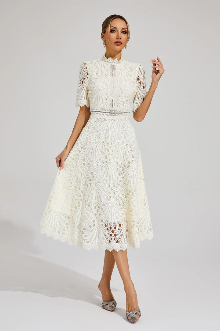 Full view of crochet midi dress in ivory white with openwork design and midi length