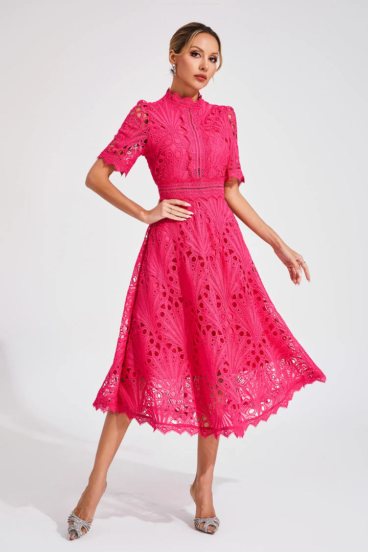 Detail of scalloped sleeve edges and intricate crochet bodice on midi dress