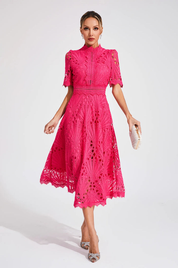 Full-length view of crochet midi dress styled with heeled sandals for occasion wear