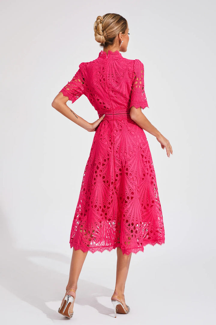 Crochet midi dress shown with flared skirt and geometric openwork pattern throughout