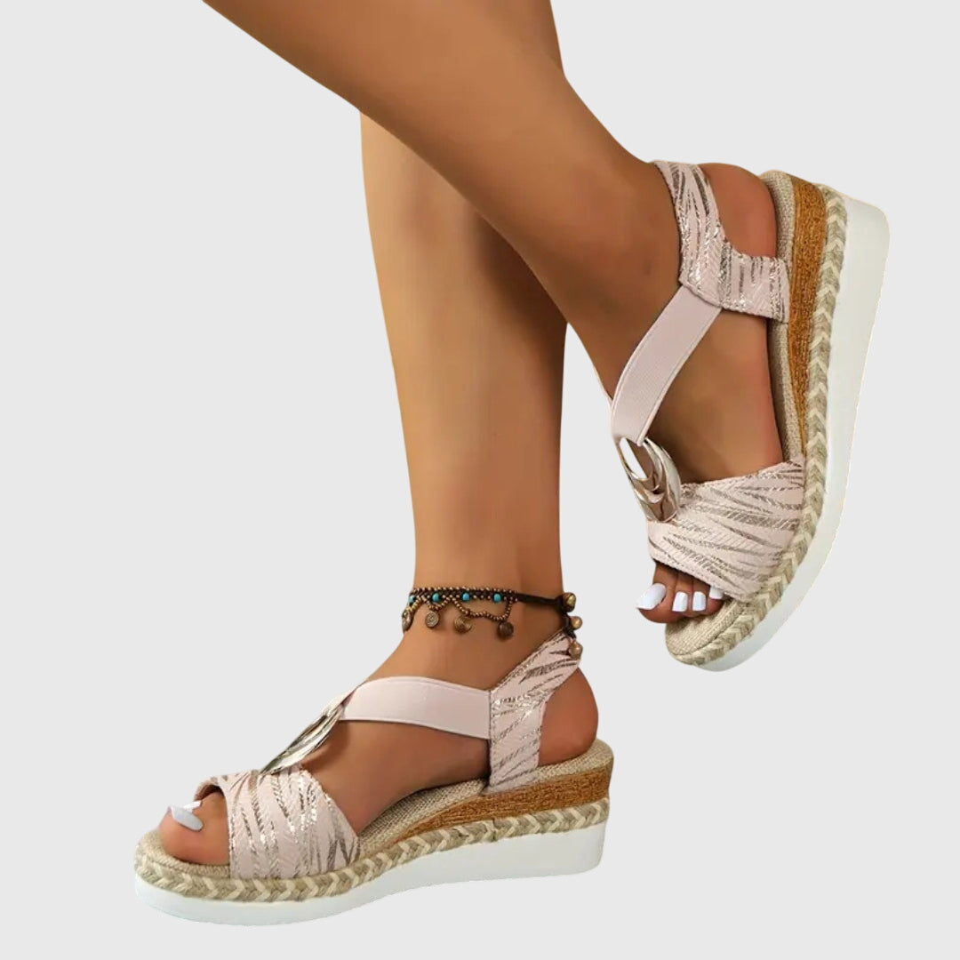 Hattie Women's Orthopedic Buckle Strap Sandals in beige with textured straps and espadrille platform sole on model foot