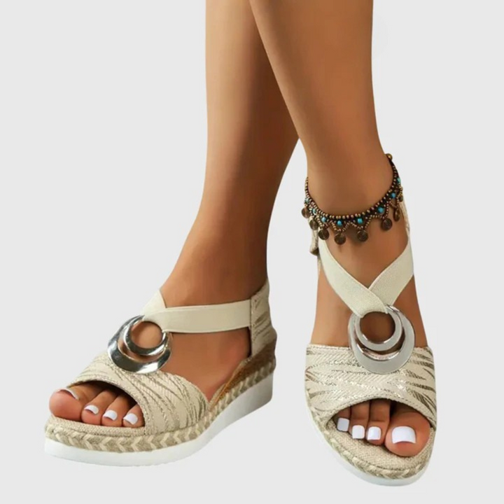 Top-down view of women's orthopedic sandals highlighting textured strap pattern and footbed construction