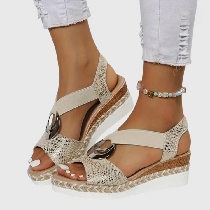 Women's orthopedic buckle strap sandals in neutral tone with platform sole and supportive arch