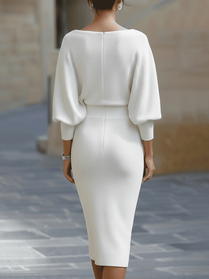 Side profile of Women's Boat Neck Batwing Sleeve Midi Bodycon Dress highlighting ribbed texture and midi length