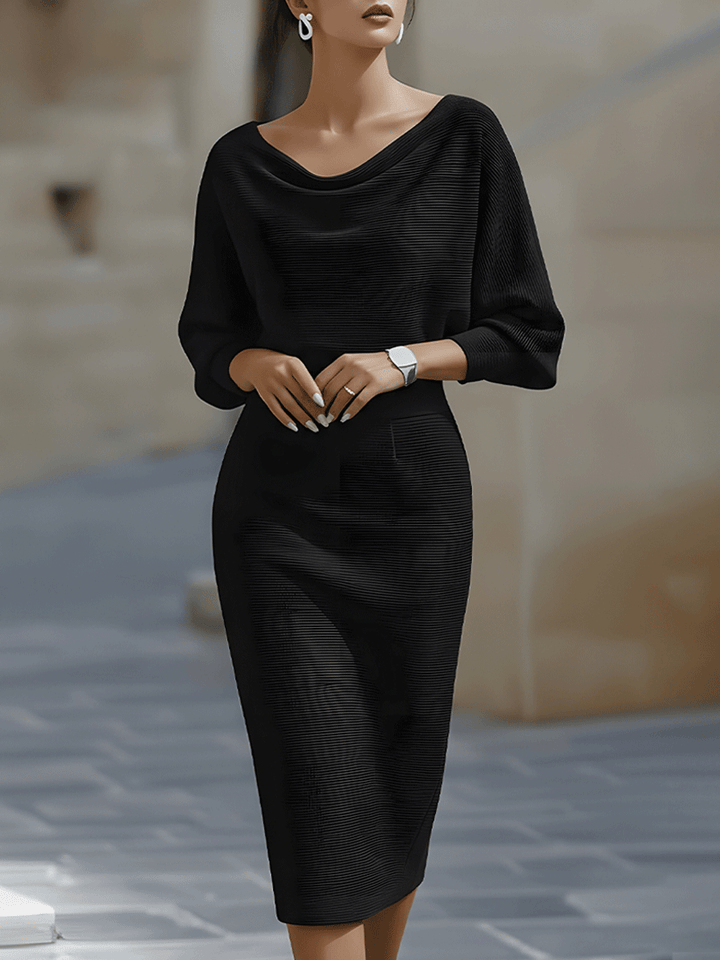 Detail shot of ribbed knit fabric and bodycon fit on Women's Boat Neck Batwing Sleeve Midi Bodycon Dress