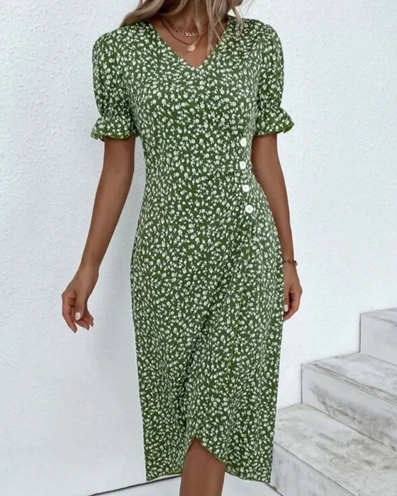 Floral wrap midi dress in green with cream print, V-neckline and adjustable tie waist for flattering silhouette