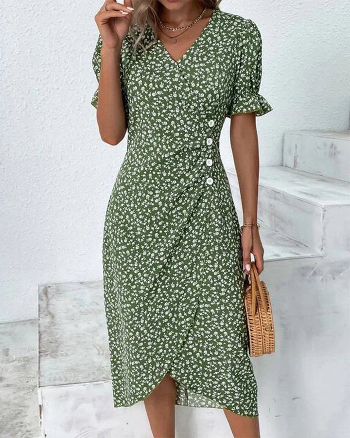 Floral wrap dress featuring ruffled short sleeves and side tie for customisable fit