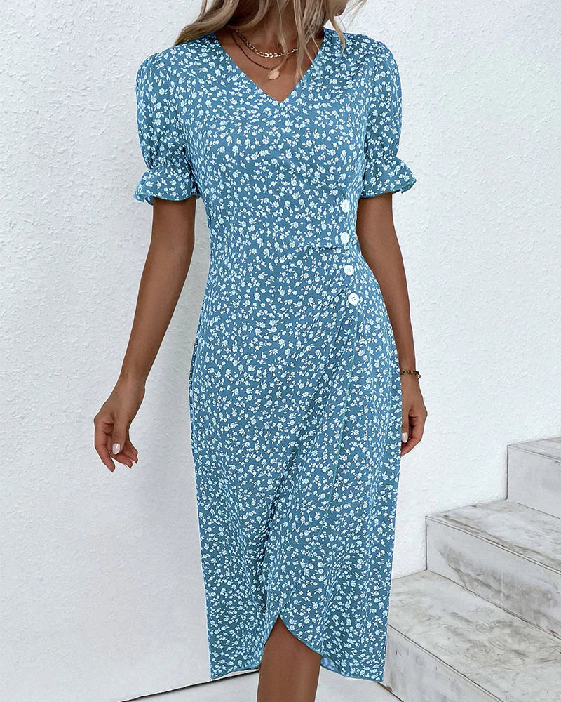 V-neck floral wrap dress in green showcasing adjustable waist tie and midi-length hem