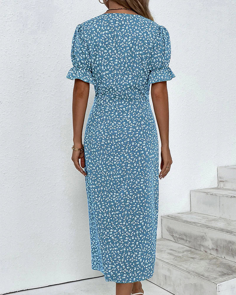 Floral midi dress with wrap front and ruffled sleeves, ideal for weekend and evening occasions