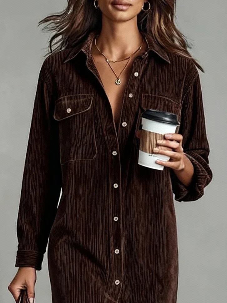 Woman styling button-up midi dress with ankle boots for casual autumn outfit
