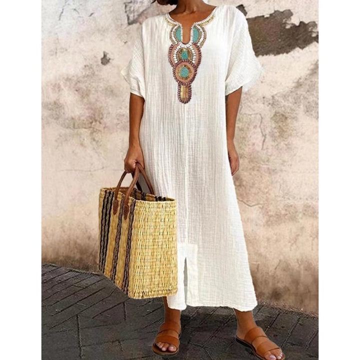 Detail shot of split hem on Summer Maxi Dress showing modern edge and ease of movement