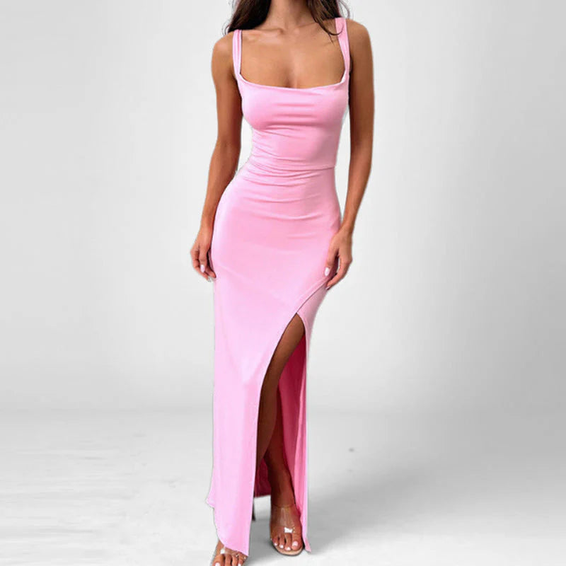 Full-length evening dress with dramatic leg slit and structured silhouette