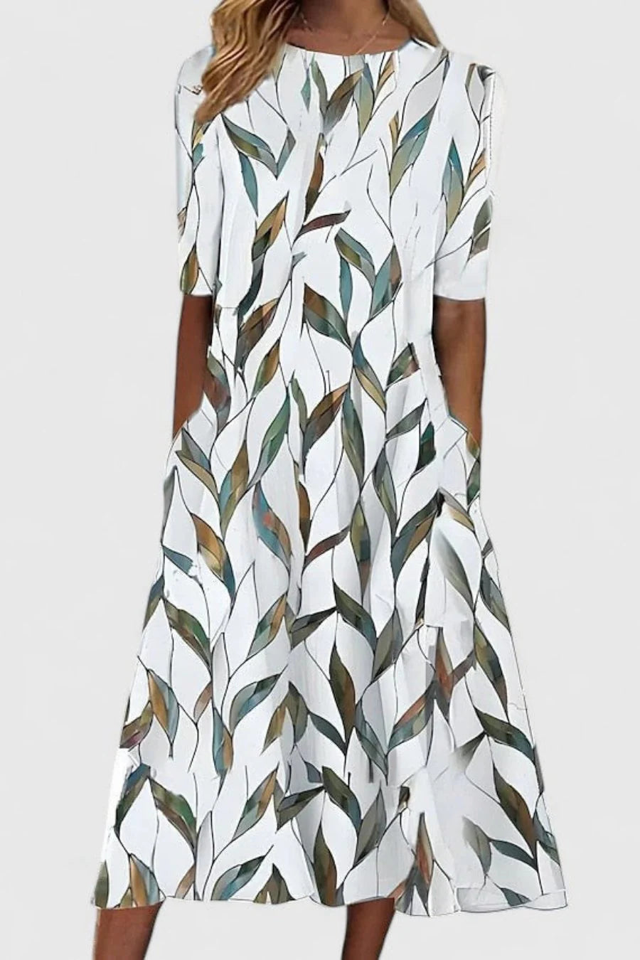 Side view of botanical print midi dress showing relaxed A-line cut and side pocket detail